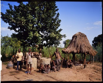 Burkina Faso, Poni province, Lobi land, Loropéni, peasants posing with bow and arrows in the farmyard