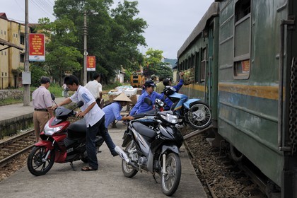 Vietnam, day train from Lao Cai to Hanoi, Yen Bai station, the motorbikes go into a dedicated wagon