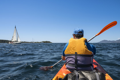 France, Alpes-Maritimes, Cannes, kayaking in the Lerins Islands, passage between Cap de la Croisette and Ile Sainte-Marguerite in the background left