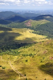 France, Puy de Dome, Parc Naturel Régional des Volcans d'Auvergne (regional nature park of Auvergne volcanoes), the northern part of the Chaine des Puys listed as World heritage by UNESCO, the path leading to the Traversin and the Puy Pariou crater