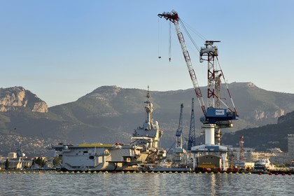 France, Var, Toulon, the naval base (Arsenal), the Charles de Gaulle nuclear-powered aircraft carrier on mid-life renovation and the mont Caume in the background
