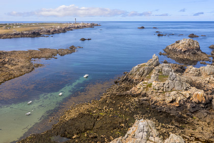 France, Finistère, Iroise Sea, Ouessant Island, the Yuzin anchorage on the north coast and the Créac'h lighthouse in the background (aerial view)