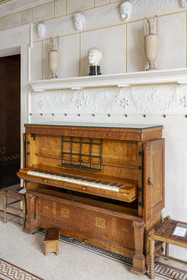 France, Alpes-Maritimes, Beaulieu-sur-Mer, neo-Greek style villa Kerylos build in 1908 by architect Emmanuel Pontremoli, the Oikos or room dedicated to the arts, the only folding camouflaged piano made by Pleyel
