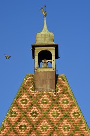 France, Haut Rhin, the Alsace Wine Route, Bergheim, varnished roof of the high gate dating from the 14th century