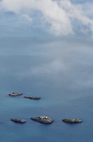 Norway, Nordland County, lighthouse of Moholmen off the Lofoten islands (aerial view)