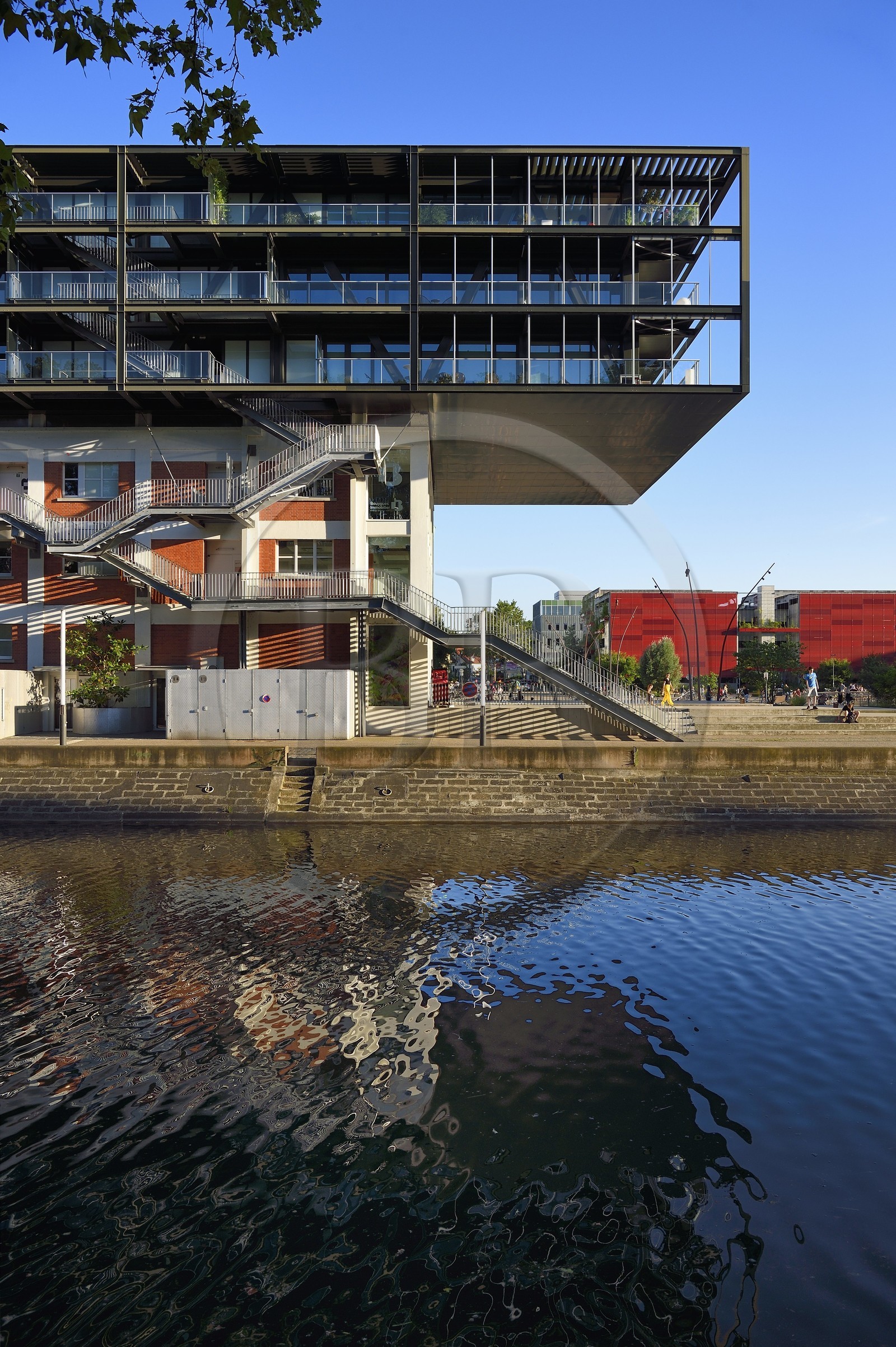 France, Bas Rhin, Strasbourg, development of port du Rhin (Rhine's harbour) and conversion of breakwater of Bassin d'Austerlitz, presqu'ile Malraux (Malraux peninsula), former Mole Seegmuller warehouse turned into commerce and residential flats, on the edge of the Austerlitz basin France, Bas Rhin, Strasbourg, development of port du Rhin (Rhine's harbour) and conversion of breakwater of Bassin d'Austerlitz, presqu'ile Malraux (Malraux peninsula), former Mole Seegmuller warehouse turned into commerce and residential flats, on the edge of the Austerlitz basin