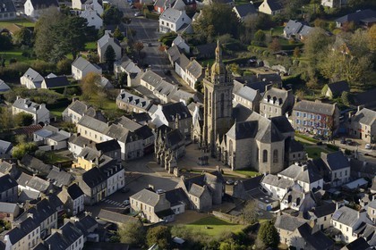 France, Finistere, the calvary and the church in the Parish close (enclos paroissial) (aerial view)