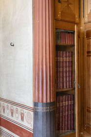 France, Alpes-Maritimes, Beaulieu-sur-Mer, neo-Greek style villa Kerylos build in 1908 by architect Emmanuel Pontremoli, the library, the books are hidden by doors because anachronistic