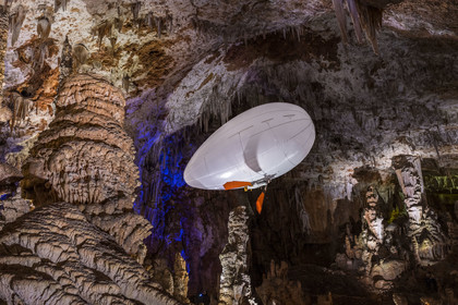 France, Gard, Mejannes-le-Clap, grotte de La Salamandre (Salamander cave), discovery of the cave in Aéroplume®, an individual dirigible balloon inflated with helium which allows you to fly away by flapping your wings