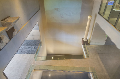 France, Gard, Nimes, Romanity museum (Musée de la Romanite) by architect Elizabeth de Portzamparc, passage under the museum where you can see two of the four columns that stood at the corners of the nymphaeum of the Augusteum