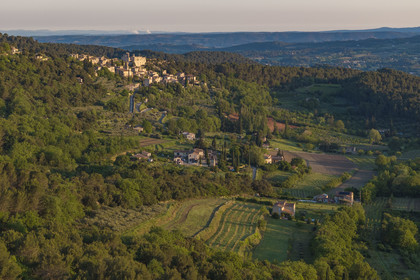 France, Vaucluse, Dentelles de Montmirail mountains, Crestet, the hilltop village of Crestet and its 9th century castle (aerial view)