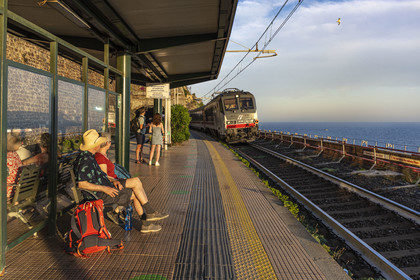 Italy, Liguria, Cinque Terre National Park listed as World Heritage by UNESCO, village of Manarola, the train entering the station