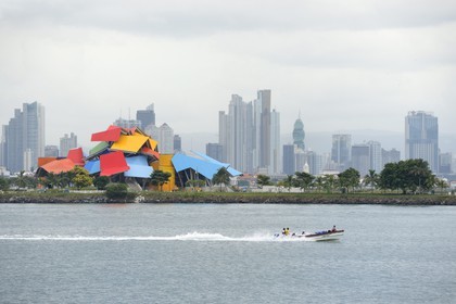 Panama, Panama City, the Biodiversity Museum named Panama Bridge of Life by architect Frank Gehry, the waterfront and skyscrapers in background