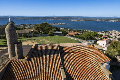 France, Herault, Sete, Notre-Dame-de-la-Salette chapel built at the top of Mont Saint-Clair and the Etang de Thau in the background