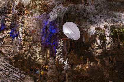 France, Gard, Mejannes-le-Clap, grotte de La Salamandre (Salamander cave), discovery of the cave in Aéroplume®, an individual dirigible balloon inflated with helium which allows you to fly away by flapping your wings