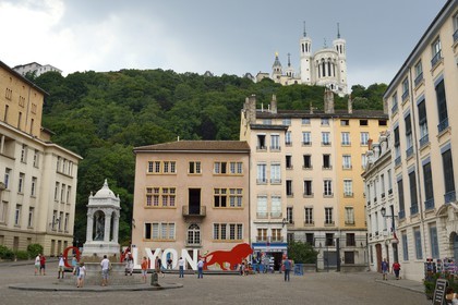 France, Rhone, Lyon, historical site listed as World Heritage by UNESCO, Vieux Lyon (Old Town), in Place St Jean under the Notre Dame de Fourviere Basilica, OnlyLyon is the aglomeration Communication label