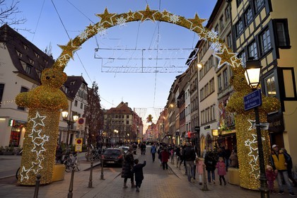 France, Bas Rhin, Strasbourg, old town listed as World Heritage by UNESCO, the large arch - Strasbourg, Capital of Christmas - located at the entrance of the rue du Vieux Marché aux Poissons