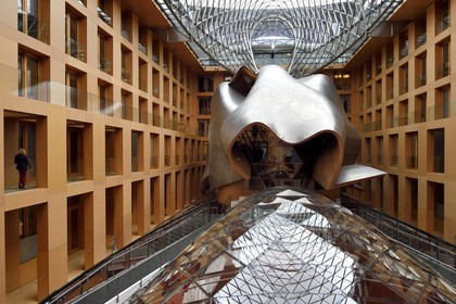 Germany, Berlin, Pariser Platz, DZ Bank (former DG Bank) head office, large atrium designed by architect Franck Gehry, huge steel sculpture which shelters a conference room