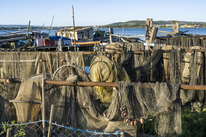 France, Herault, Sete, la Pointe Courte district, fishing district on the banks of the Etang de Thau, fishing nets drying in the sun