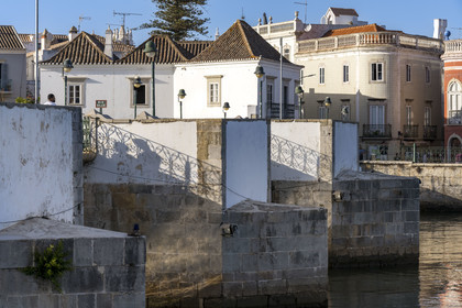 Portugal, Algarve, Tavira on the edge of the Ria Formosa Natural Park, the 12th century 7-arch Roman bridge over the Rio Gilao