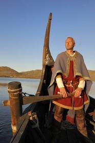 Norway, Nordland County, Lofoten Islands, Vestvagoy Island, Lofotr drakkar identically built on Borg Lake and the captain Terje Boe