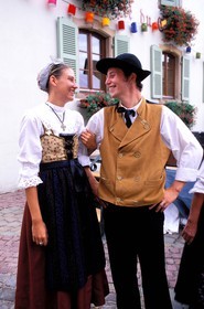 France, Haut Rhin, wine celebration at Eguisheim village, labelled Les Plus Beaux Villages de France (The Most Beautiful Villages of France), Alsatian couple in costumes