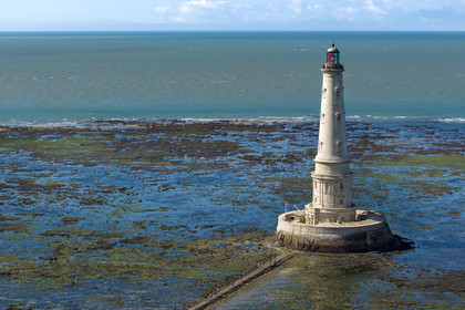 France, Gironde, Verdon sur Mer, rocky plateau of Cordouan at low tide, lighthouse of Cordouan, listed as World Heritage by UNESCO (aerial view)