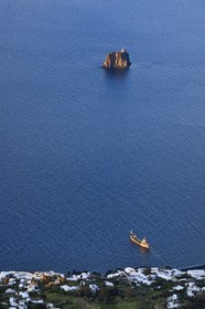Italy, Sicily, Aeolian Islands, listed as World Heritage by UNESCO, Stromboli island, islet of Strombolicchio, rock of solidified magma from an old volcanic cap, now occupied by a lighthouse