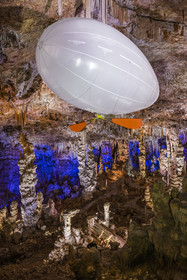 France, Gard, Mejannes-le-Clap, grotte de La Salamandre (Salamander cave), discovery of the cave in Aéroplume®, an individual dirigible balloon inflated with helium which allows you to fly away by flapping your wings
