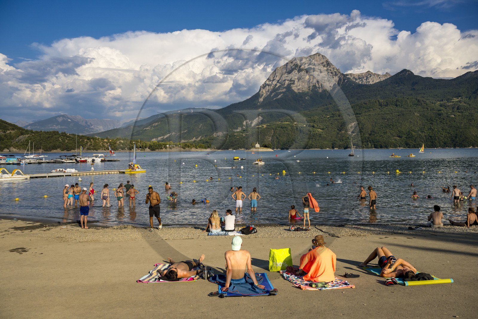 France, Hautes Alpes, Chorges, Serre-Ponçon lake, the bay and the Saint-Michel chapel, the summit of the Pic de Morgon (2324 m) in the background