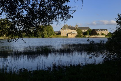 France, Ille-et-Vilaine, forest of Broceliande, the abbey of Paimpont on the edge of the pond