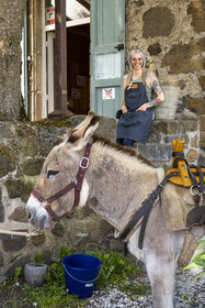 France, Haute-Loire (43), Ussel, hiking with a donkey on the Robert Louis Stevenson Trail (GR 70), Laetitia manages the “A boire et à manger” café