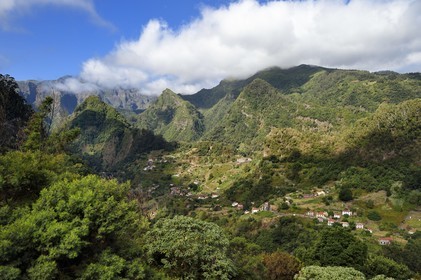 Portugal, Madeira Island, Sao Roque do Faial valley at the foot of the central mountain range and Pico Ruivo (1862m)