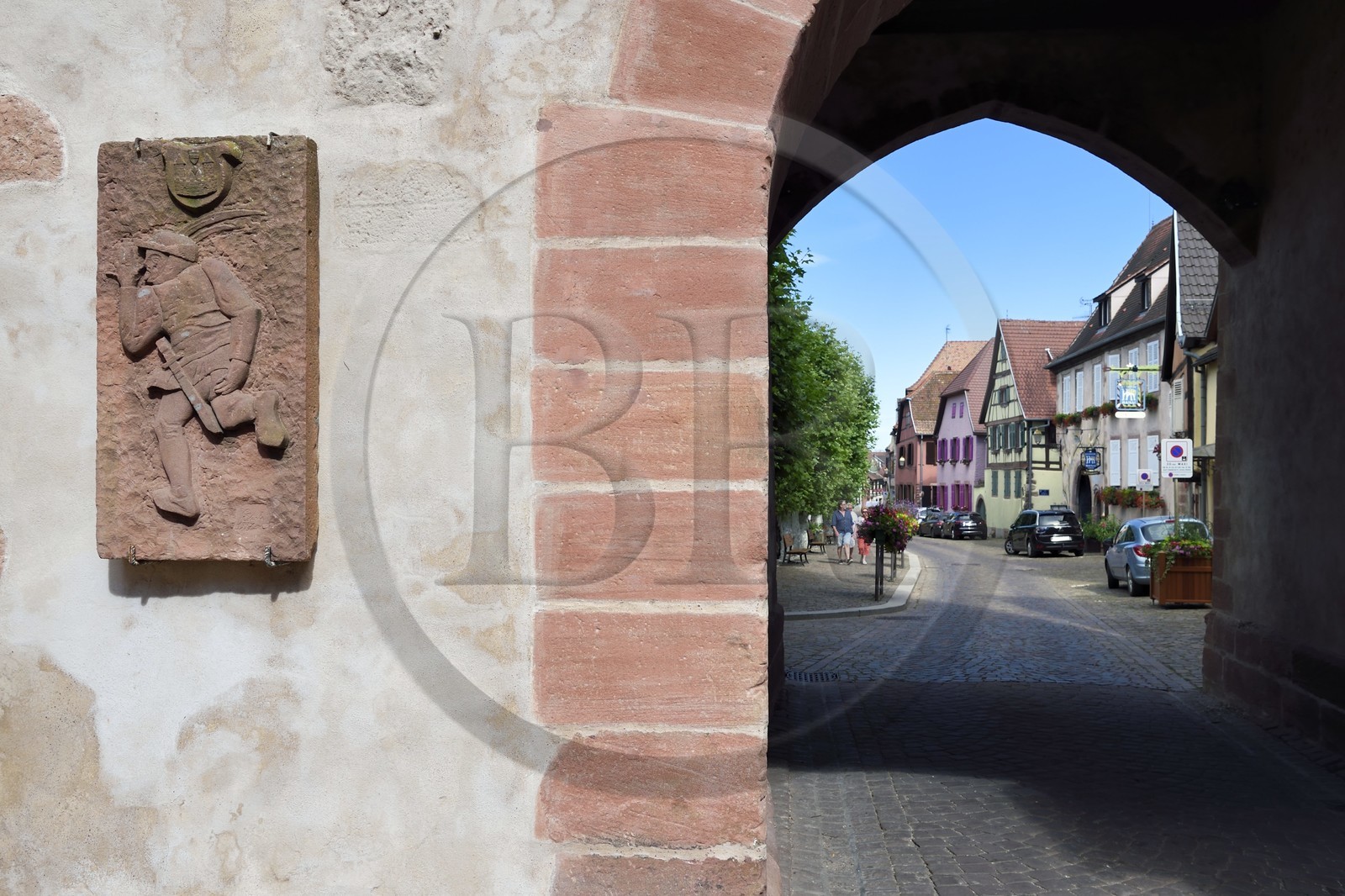 France, Haut Rhin, the Alsace Wine Route, Bergheim, the high gate dating from the 14th century, bas-relief of the Lack'mi which illustrates the right of asylum that gave the village in the Middle Ages France, Haut Rhin, the Alsace Wine Route, Bergheim, the high gate dating from the 14th century, bas-relief of the Lack'mi which illustrates the right of asylum that gave the village in the Middle Ages