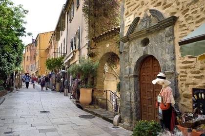France, Var, Bormes les Mimosas, the rue Carnot, main street of the old town, serpentine stone house porch