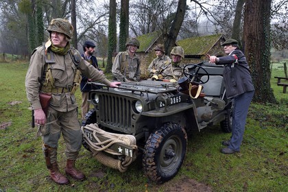 France, Eure, Sainte Colombe prés Vernon, Allied Reconstitution Group (US World War 2 and french Maquis historical reconstruction Association), reenactors in uniform of the 101st US Airborne Division and partisans of the French Forces of the Interior (FFI)