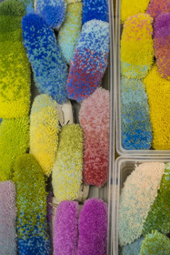 France, Herault, Lodève, Manufacture de la Savonnerie (Savonnerie manufactory) unique annex of the National Carpet Factory of the Savonnerie des Gobelins in Paris, wool color swatches pompons