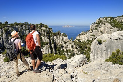 France, Bouches du Rhone, Marseille, National Park of the Calanques, Calanque En Vau (cove), Breach of Castelvieil and the Riou Archipelago in the background (request for authorization necessary before publication)