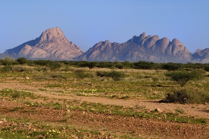 Namibia, Erongo region, Damaraland, Spitzkoppe or Spitzkop (1784 m), granite mountain in the Namib Desert, the Great Spitzkoppe on the right and the Little Spitzkoppe on the left