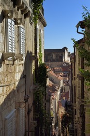Croatia, Dalmatia, Dalmatian coast, Dubrovnik, Historic Centre listed as World Heritage by UNESCO, cross alley (Ulica Dropceva) with stairs and the Church of Saint Ignatius (Saint Ignatius) in the background
