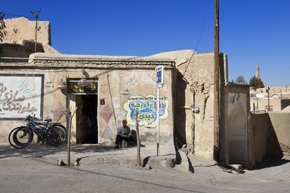 Iran, Isfahan province, Dasht-e Kavir desert, city of Nain also known as Naein, house with graffiti showing how do you see the world