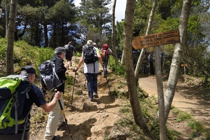 Italy, Sicily, Aeolian Islands, listed as World Heritage by UNESCO, Salina Island, hikers climing Monte Fossa delle Felci