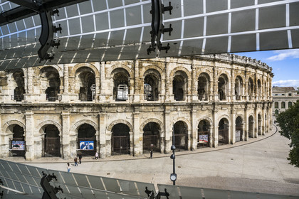 France, Gard, Nimes, Romanity museum (Musée de la Romanite) by architect Elizabeth de Portzamparc, the arena amphitheater faces it