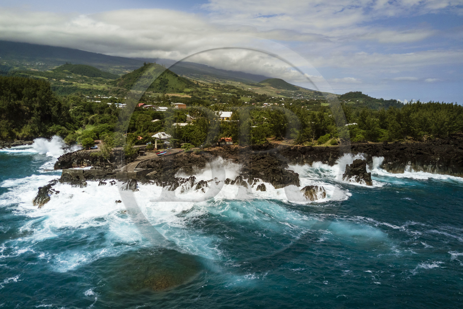 France, Reunion island (French overseas department), Saint-Joseph, the small port of the Marine de Langevin in a natural corridor of basalt rock from an old lava flow which allowed the installation of a landing stage (aerial view)