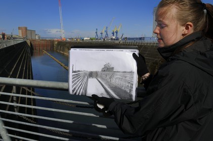 United Kingdom, Northern Ireland, Belfast, Queen's Island, Thompson Dry Dock, Olympic & Titanic Slipways, a guide showing us the Titanic in site in 1912