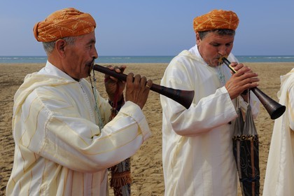 Morocco, Oriental Region, La Reggada traditional dance and music on the beach