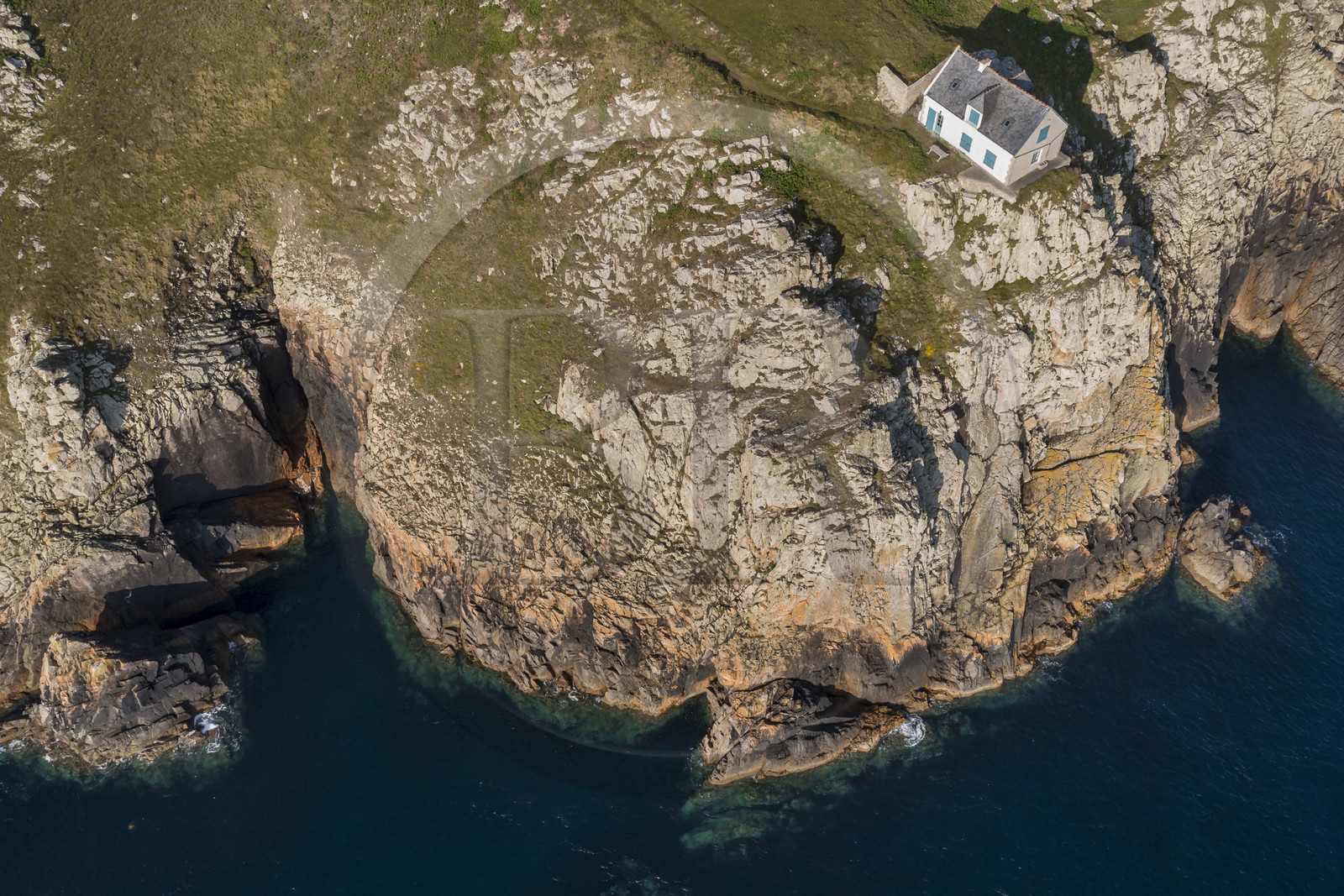 France, Finistère, Iroise Sea, Ouessant Island, house on Pointe de Bac'haol on the east coast (aerial view)