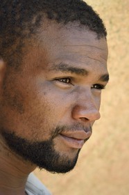 Namibia, Erongo region, Damaraland, the Pondok Mountains at the east of Spitzkoppe in the Namib Desert, Benny a local Damara guide