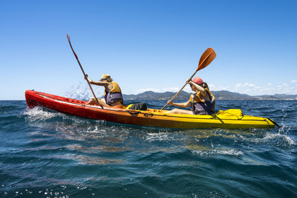 France, Alpes-Maritimes, Cannes, kayaking in the Lerins Islands, passage between Cap de la Croisette and Ile Sainte-Marguerite, the Esterel mountains in the background