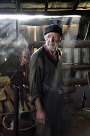 Georgia, Kakheti, Tusheti National Park, sheepfold not far from the village of Bochorna, the shepherd Kako makes his cheese in a traditional way